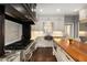 Well-designed kitchen featuring a large island, stainless steel appliances, and elegant cabinetry at 591 E Morningside Ne Dr, Atlanta, GA 30324