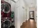 Convenient laundry area with stacked washer and dryer, providing functionality and saving space at 591 E Morningside Ne Dr, Atlanta, GA 30324