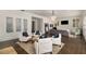 A well-lit living room showcasing hardwood floors and neutral color palette at 591 E Morningside Ne Dr, Atlanta, GA 30324