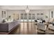 Spacious living room featuring ample seating, hardwood floors, and abundant natural light at 591 E Morningside Ne Dr, Atlanta, GA 30324