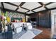 Spacious bedroom with stylish design, hardwood floors, and sliding barn door at 130 26Th Nw St # 801, Atlanta, GA 30309