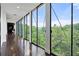Hallway features floor-to-ceiling windows offering natural light and panoramic views at 130 26Th Nw St # 801, Atlanta, GA 30309