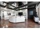 Living space features dark wood floors, black beam ceiling and an open floorplan at 130 26Th Nw St # 801, Atlanta, GA 30309
