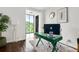 Stylish home office with natural light and a green modern desk at 130 26Th Nw St # 801, Atlanta, GA 30309