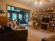 Cozy living room features plush seating, built-in shelves and a decorative deer mount at 2564 Wren Nw Ave, Duluth, GA 30096