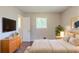 Bedroom with a plush bed and bedside table with a large window at 29 Parkwood Ne Dr, Kennesaw, GA 30144