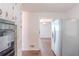 Classic kitchen with white cabinets and a refrigerator at 29 Parkwood Ne Dr, Kennesaw, GA 30144