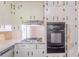 Kitchen featuring stainless steel appliances and white cabinets at 29 Parkwood Ne Dr, Kennesaw, GA 30144