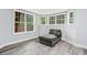 Basement with wood flooring and windows showing nature outside at 642 Towering Pine Trl, Lawrenceville, GA 30045