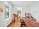 Bright home office space with natural light, wood floors, and desk area at 642 Towering Pine Trl, Lawrenceville, GA 30045