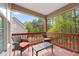 Cozy covered patio with seating, overlooking a green backyard at 642 Towering Pine Trl, Lawrenceville, GA 30045