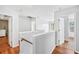 Bright upstairs hallway with wood floors leading to bedrooms and bathrooms at 642 Towering Pine Trl, Lawrenceville, GA 30045