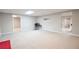 Spacious basement with neutral carpeting, ideal for recreation or office space at 811 Ivy Ridge Dr, Loganville, GA 30052