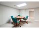Recreational space with a game table and comfortable seating in the basement at 811 Ivy Ridge Dr, Loganville, GA 30052