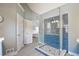 Modern bathroom with glass-enclosed shower, updated fixtures, and white oak floors at 811 Ivy Ridge Dr, Loganville, GA 30052