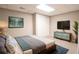 Cozy bedroom with carpet, closet and television and painting displayed in a comfortable setting at 811 Ivy Ridge Dr, Loganville, GA 30052
