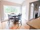 Cozy breakfast nook bathed in natural light from large windows, perfect for enjoying meals with a view at 811 Ivy Ridge Dr, Loganville, GA 30052