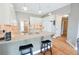 Bright kitchen features stainless steel appliances, granite countertops, and hardwood floors at 811 Ivy Ridge Dr, Loganville, GA 30052