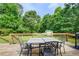 Outdoor deck with outdoor furniture and room for a grill at 173 Elder Dr, Social Circle, GA 30025