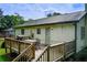 Cozy backyard deck offers a great space for outdoor dining and relaxation at 173 Elder Dr, Social Circle, GA 30025