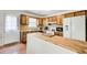 Well-appointed kitchen featuring a breakfast bar, modern appliances, and plenty of storage space at 173 Elder Dr, Social Circle, GA 30025