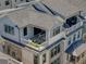 Aerial view showcasing the townhome's private balcony and neighborhood at 323 Concord St, Alpharetta, GA 30009