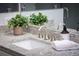Bathroom vanity with granite counters, a white undermount sink, and stainless steel faucet at 323 Concord St, Alpharetta, GA 30009