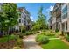 Serene view of the community's landscaping and charming architecture at 323 Concord St, Alpharetta, GA 30009
