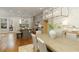 Open concept dining area showing sightlines into the kitchen and lots of natural light at 323 Concord St, Alpharetta, GA 30009