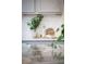 A close up of a kitchen counter with decor and accessories on display at 323 Concord St, Alpharetta, GA 30009