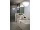 Luxurious bathroom with soaking tub, separate shower, and modern fixtures at 323 Concord St, Alpharetta, GA 30009
