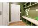 Stylish mudroom with custom shelving and a cozy bench seat at 323 Concord St, Alpharetta, GA 30009