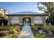 Attractive pool house with stone accents and arched entrance to the community swimming pool at 323 Concord St, Alpharetta, GA 30009