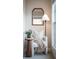 Sitting area with comfortable chair, side table, standing lamp and lots of light at 323 Concord St, Alpharetta, GA 30009