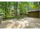 The spacious back deck overlooks the lush green backyard at 5245 Olde Mill Rd, Woodstock, GA 30188