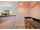 Convenient wet bar with storage and countertop space at 5245 Olde Mill Rd, Woodstock, GA 30188