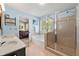 This spacious bathroom features double sinks, a soaking tub, and glass enclosed shower at 5245 Olde Mill Rd, Woodstock, GA 30188