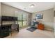 Functional home office with built-in desk, natural light, and neutral colors at 5245 Olde Mill Rd, Woodstock, GA 30188