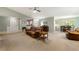 Large living room with open layout, dining area, and neutral tones at 5245 Olde Mill Rd, Woodstock, GA 30188