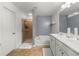 Well-lit bathroom featuring a soaking tub, shower, and double vanity at 6213 Indian Wood Cir, Mableton, GA 30126