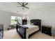 Bedroom with dark wood furniture, exercise equipment, and paneled walls at 6213 Indian Wood Cir, Mableton, GA 30126