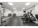 Well-equipped fitness center with treadmills, weights, and inspiring wall art at 6213 Indian Wood Cir, Mableton, GA 30126