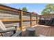 Relaxing back deck with privacy fence and chairs at 630 John Wesley Dobbs Ne Ave, Atlanta, GA 30312