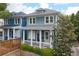 Inviting curb appeal with light-green and blue siding, white trim, and a charming front porch at 630 John Wesley Dobbs Ne Ave, Atlanta, GA 30312