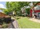 Beautifully landscaped front yard with lush greenery and charming walkway at 630 John Wesley Dobbs Ne Ave, Atlanta, GA 30312