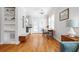 Spacious living area with hardwood floors, built-in shelving, and dining table near French doors at 630 John Wesley Dobbs Ne Ave, Atlanta, GA 30312