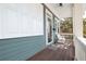 Relax on the front porch with white bench seating and enjoy the serene outdoor ambiance at 630 John Wesley Dobbs Ne Ave, Atlanta, GA 30312