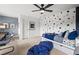 bedroom with space themed decor, two twin beds, desk, and stylish bean bag chairs at 707 Mirror Lake Parkway Way, Villa Rica, GA 30180
