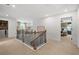 Second floor hallway provides access to rooms at 707 Mirror Lake Parkway Way, Villa Rica, GA 30180