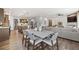 Open-concept living space flows seamlessly from kitchen to the living room with a fireplace at 707 Mirror Lake Parkway Way, Villa Rica, GA 30180
